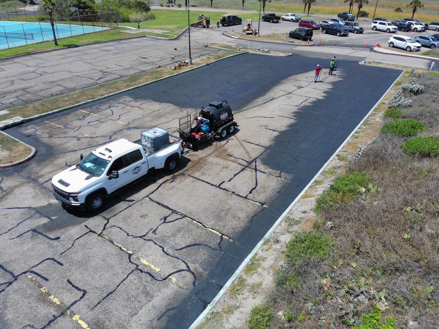 Sealcoating a parking lot